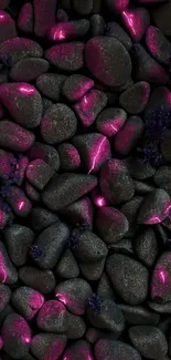 Mobile wallpaper of dark stones with glowing pink accents.