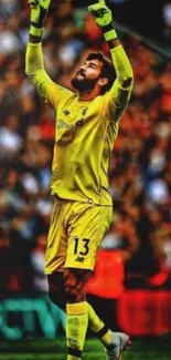 Goalkeeper points upwards in a yellow kit on the field.