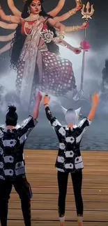 Animated figures worship a multi-armed deity.