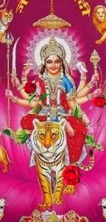 Vibrant mobile wallpaper of Goddess Durga on a tiger with pink background.