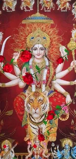 Vibrant Goddess Durga wallpaper with red background and ornate details.