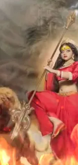 Fierce goddess in red with lion and flames, holding a trident.