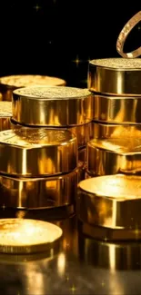 Gold coins stacked with a ring shining on black background.