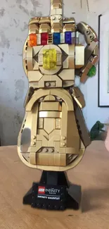 Lego Infinity Gauntlet built in gold with colorful stones.