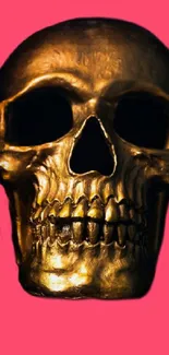 Gold skull with pink background mobile wallpaper.