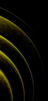 Golden abstract wallpaper with dark tones and circular patterns.