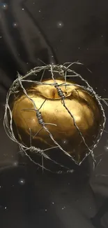 Golden apple wrapped in barbed wire on a dark background.