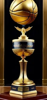 Golden basketball trophy on a pedestal.
