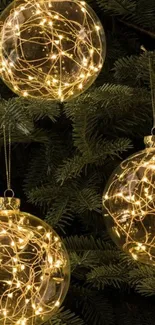 Golden baubles on Christmas tree wallpaper.