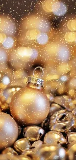 Golden baubles with a bokeh background for a festive look.