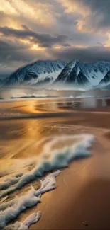 Golden beach with snowy mountains and cloudy sky in a mobile wallpaper.