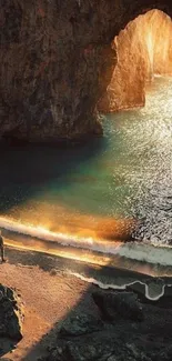 Golden sunset illuminating a coastal rock arch.