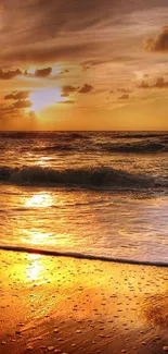 Golden beach at sunset with ocean waves.