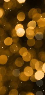 Golden bokeh effect mobile wallpaper with blurred shimmering lights.