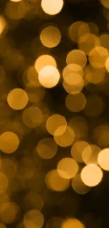 Golden bokeh abstract wallpaper with shimmering lights.