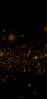 Golden bokeh particles on a black background mobile wallpaper.