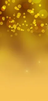 Golden bokeh wallpaper with shimmering light effects.