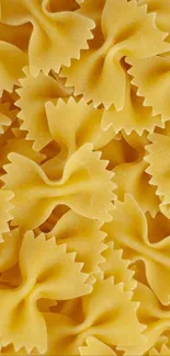 Elegant golden bow tie pasta pattern on mobile wallpaper.