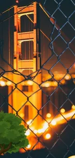 Golden Gate Bridge at night with emojis and fence.