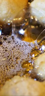 Close-up of golden bubbles in hot oil with pastry.