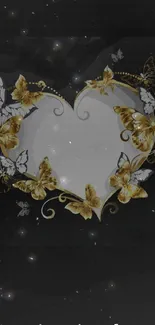 Golden butterflies forming a heart on a dark wallpaper.