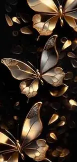 Golden butterflies on a dark background