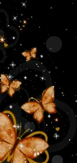 Golden butterflies on a dark background wallpaper