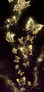 Golden butterflies on dark background wallpaper.