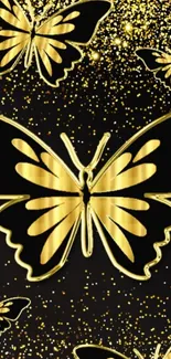 Golden butterflies with glitter on a dark background wallpaper.