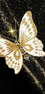 Golden butterfly on black with sparkles.