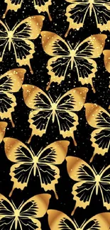 Elegant gold butterflies on black wallpaper.