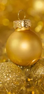 Golden Christmas ornament with glittering decorations.