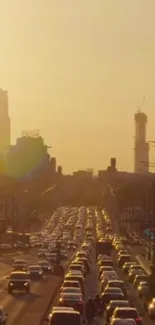 Urban sunset with traffic in golden light and skyscrapers in the background.
