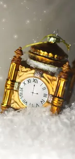 Vintage golden clock ornament on snowy background.