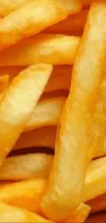 Crispy golden French fries close-up wallpaper.