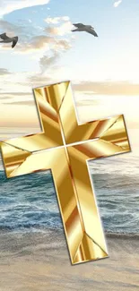 Golden cross on a serene beach background with seagulls and ocean waves.