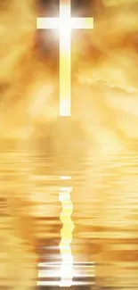 Golden cross reflects over water with cloud background.