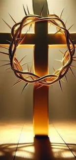 Golden cross with crown of thorns highlighted by radiant light.