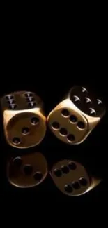 Golden dice on a black background with reflection.