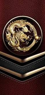 Golden dragon emblem on maroon leather texture wallpaper.