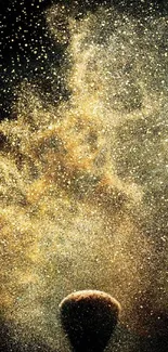 Golden dust explosion on black background.