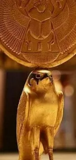 Golden Egyptian falcon with circular disk, rich historical art.