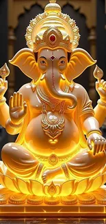 Golden statue of Ganesha with intricate details and vibrant glow.