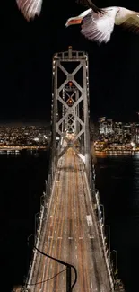 Night view of Golden Gate Bridge with city lights.