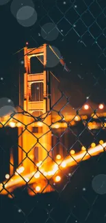 Golden Gate Bridge night view with bright orange lights and urban background.