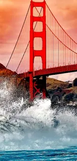 Golden Gate Bridge against sunset with ocean waves.