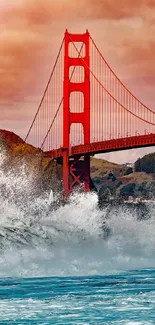 Golden Gate Bridge with ocean waves and sunset sky.