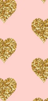 Mobile wallpaper with golden glitter hearts on a pink background.