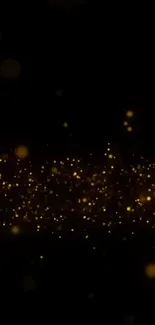 Golden glitter particles on a black background mobile wallpaper.