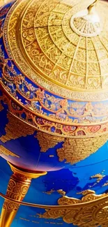 Elegant golden globe with intricate ornate design on a vibrant blue background.